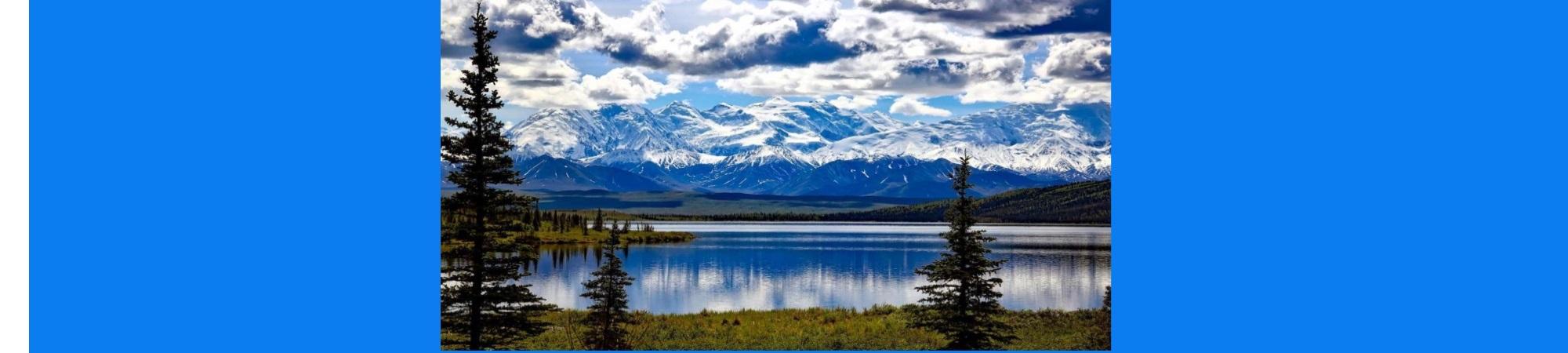 Awesome scenery; mountain range, lake, sky.