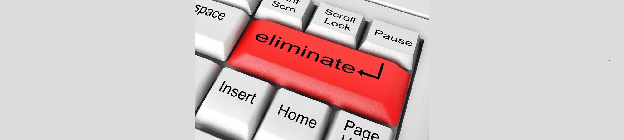 Computer keyboard with red key "Eliminate". 