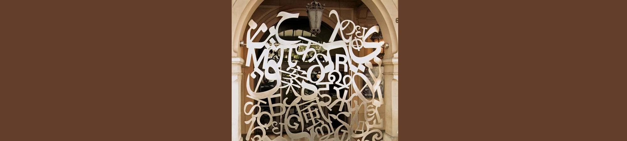 Letters and symbols in metal art